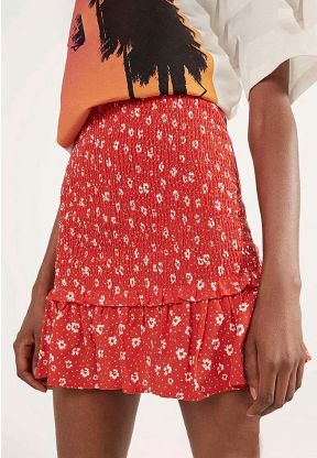 Gonna rossa con motivo floreale
