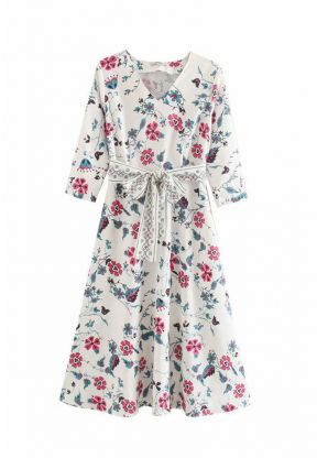 Vestito bianco ampio con motivo floreale